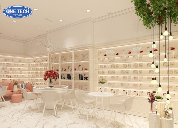 Kệ tủ gỗ màu trắng cho showroom thiệp cưới